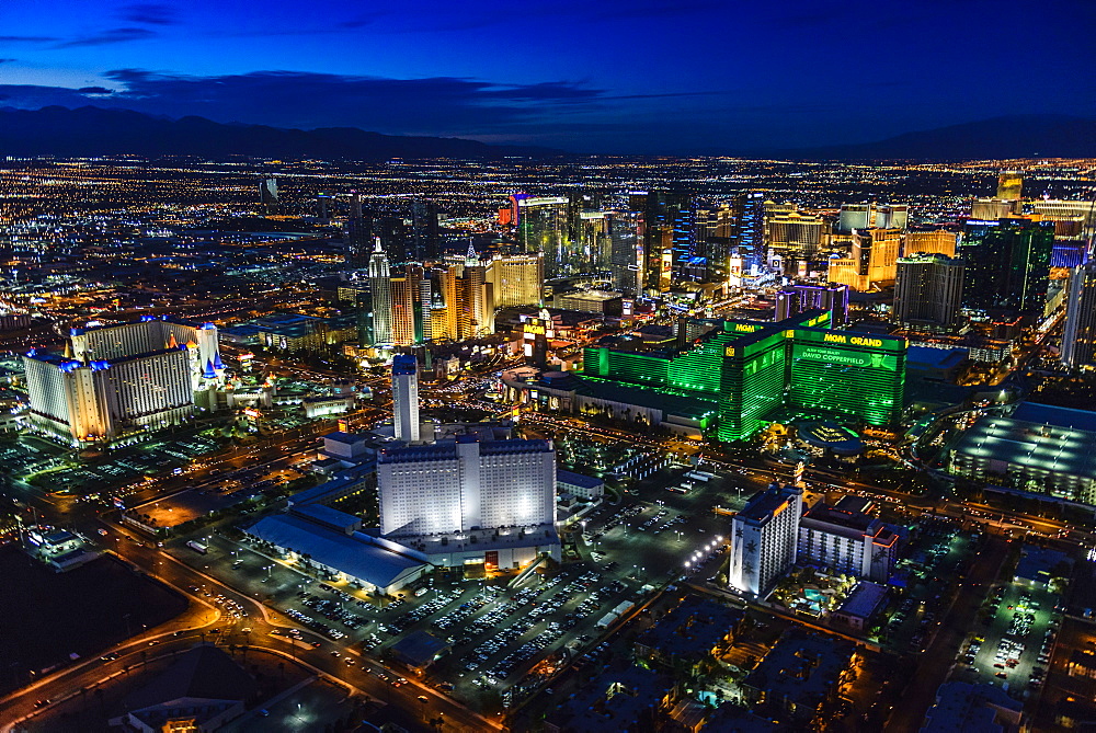 Aerial view of Las Vegas cityscape lit up at night, Las Vegas, Nevada, United States