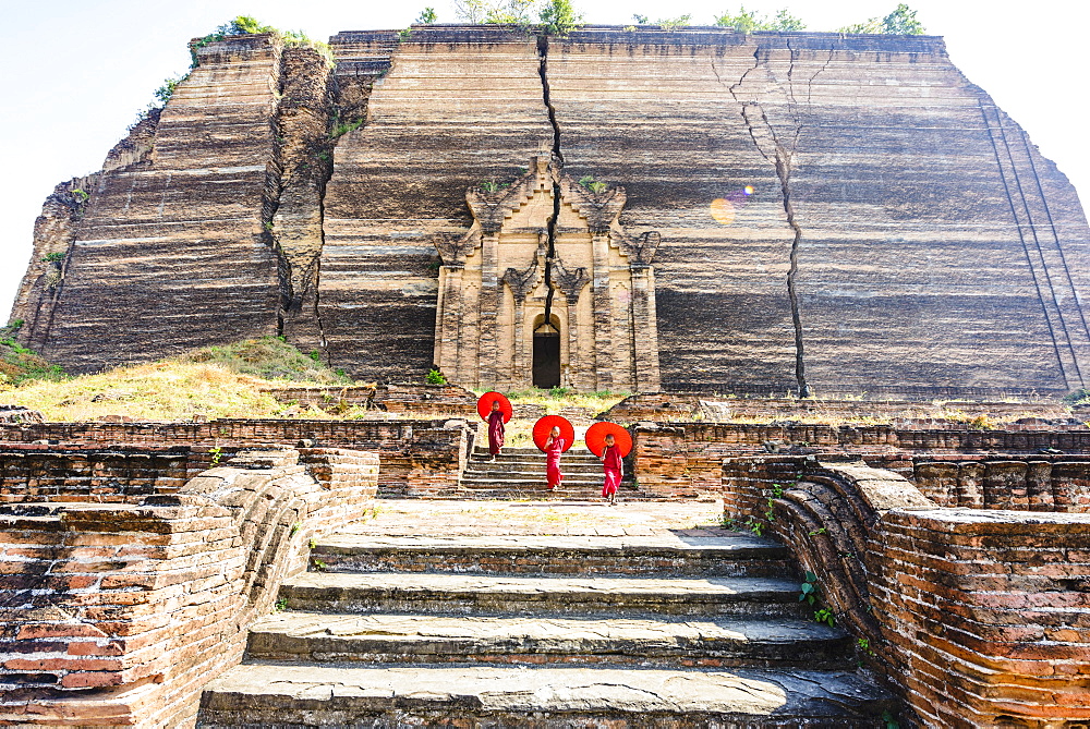 Asian women exploring temple ruins, Mingun, Saigang, Myanmar