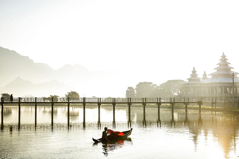 Mountains and bridge reflected in still lake, Hpa an, Kayin, Myanmar