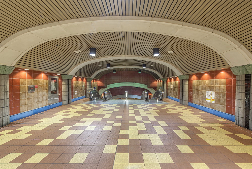 Curved roof and floor tiles of subway station