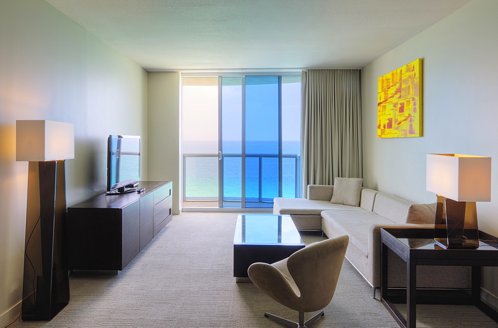 Sofa and television in hotel room, Miami, Florida, USA