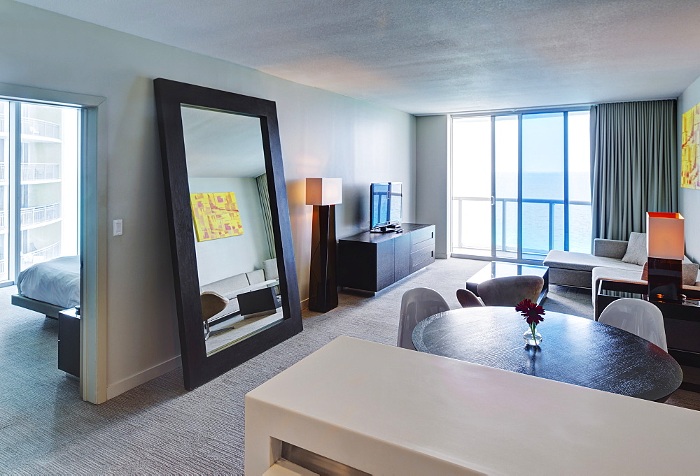 Mirror and lounge area in hotel room, Miami, Florida, USA