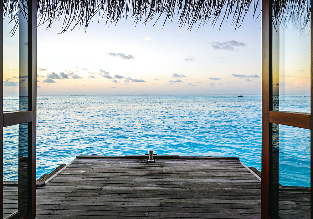 Wooden dock and ocean at sunset, Male, Maldives, Maldives