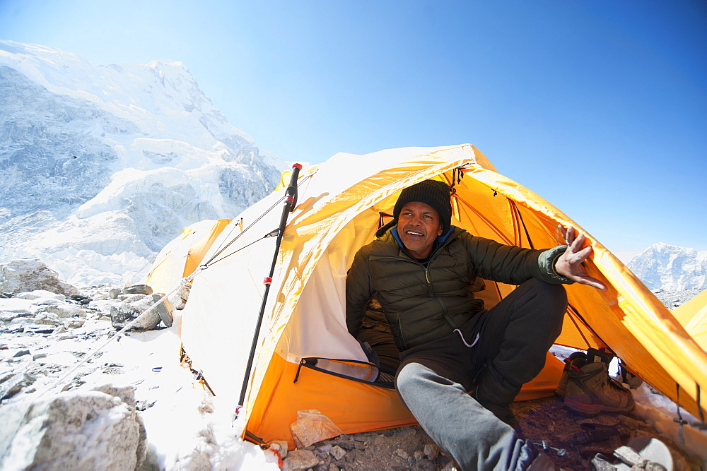 Man sitting in base camp tent, Everest, Khumbu glacier, Nepal, Everest, Khumbu glacier, Nepal