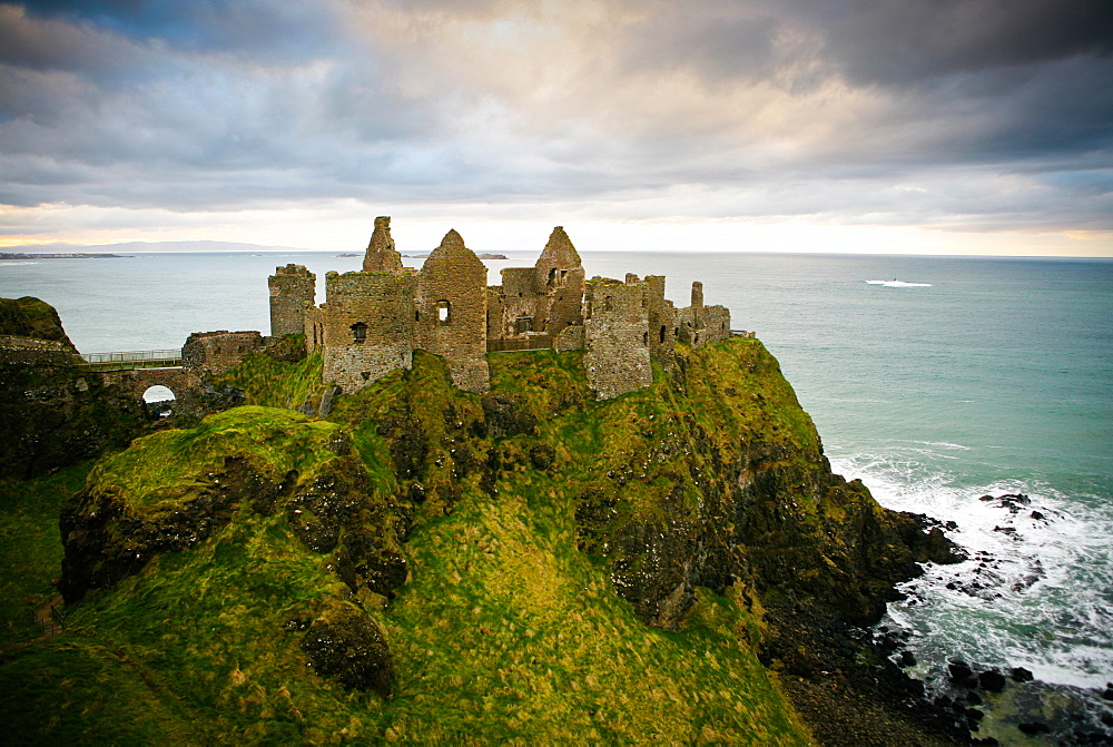Castle ruins on cliff at ocean, Bushmills, Antrim, Ireland