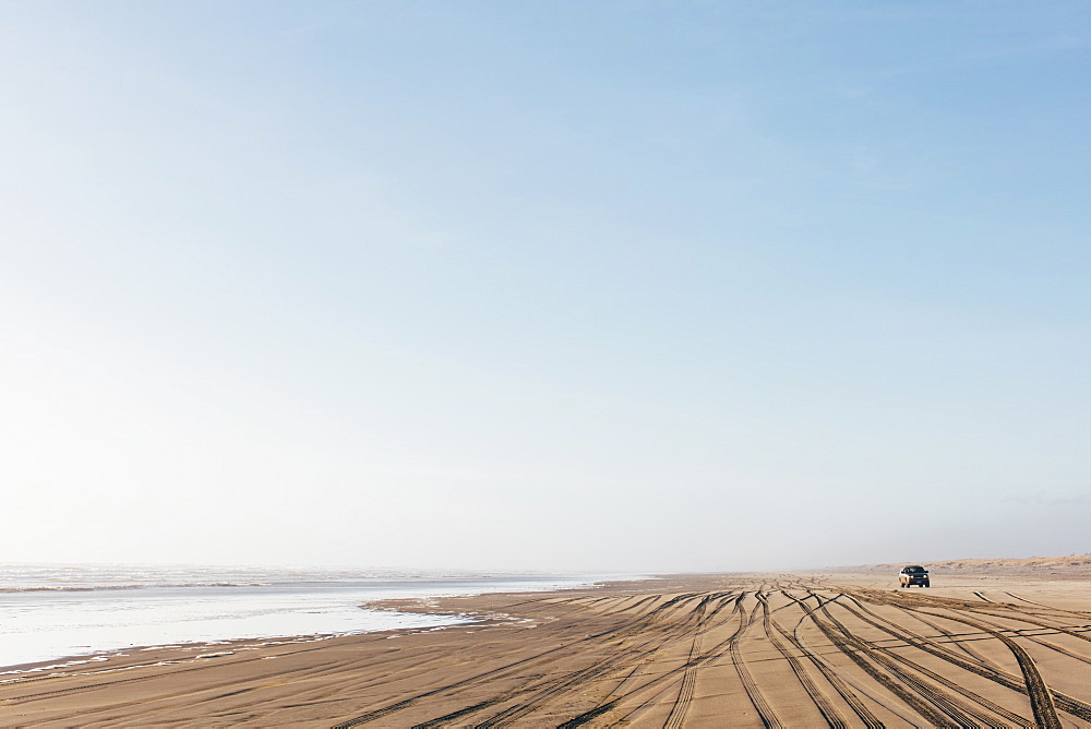 Tire tracks on the soft surface of sand on a beach, Long Beach Peninsula, Washington, United States