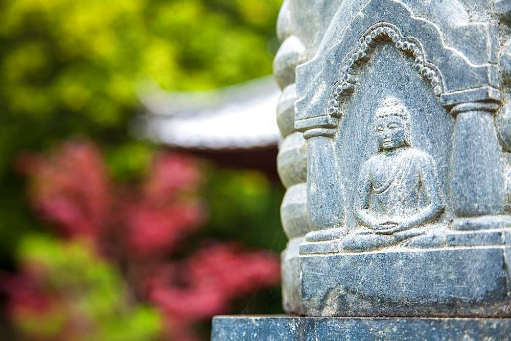 Carving of Buddha on a statue at an Buddhist Temple, Okayama, Japan