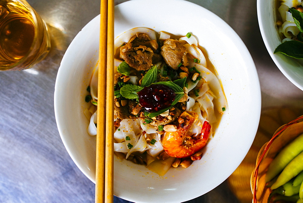 High angle close up of Mi Quang noodles, a Vietnamese specialty, Vietnam