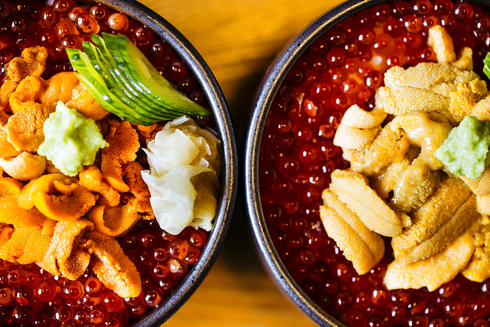 High angle close up of uni, sea urchin, with salmon roe and rice, Japan