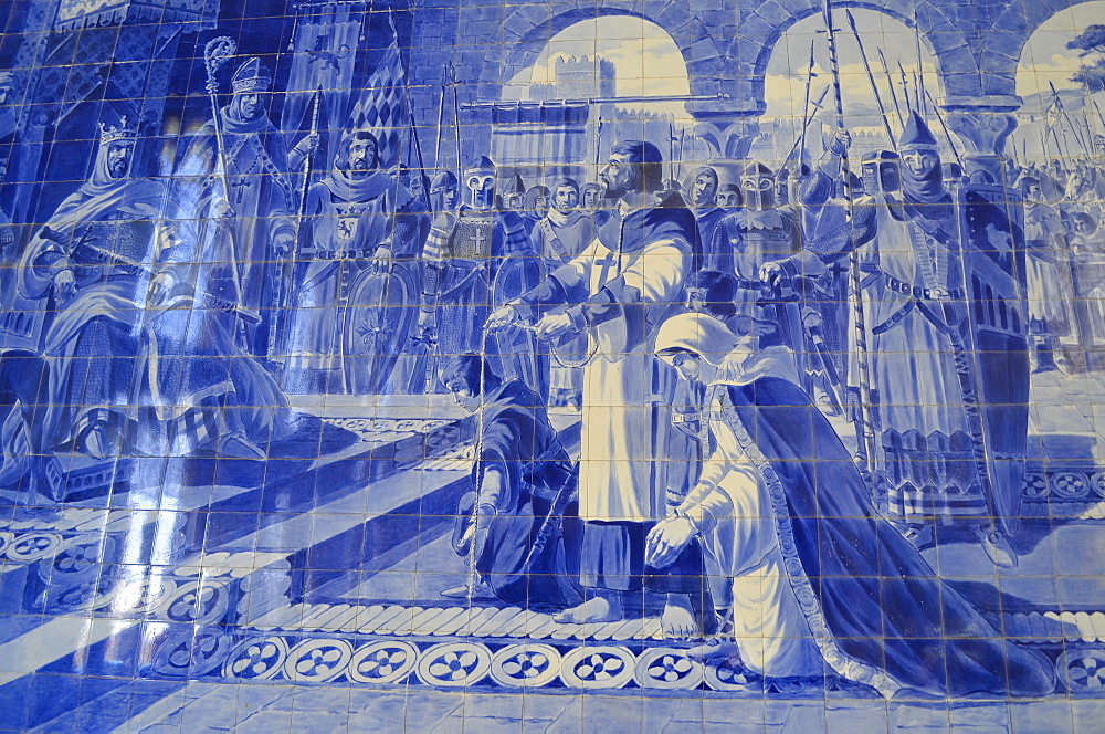 Azulejos blue and white glazed tiles, a close up of a traditional mosaic tiles depicting a historic event. Porto Railway Station, Porto, Portugal