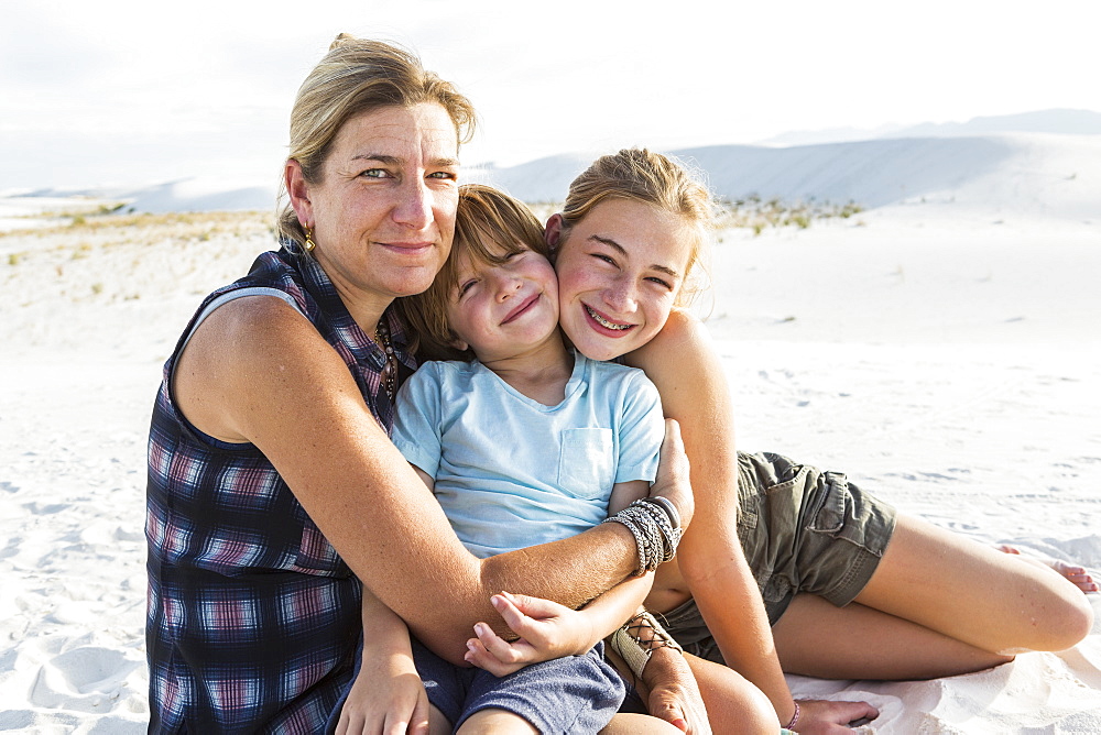 Portrait of mother and her children, White Sands National Monument, New Mexico, United States