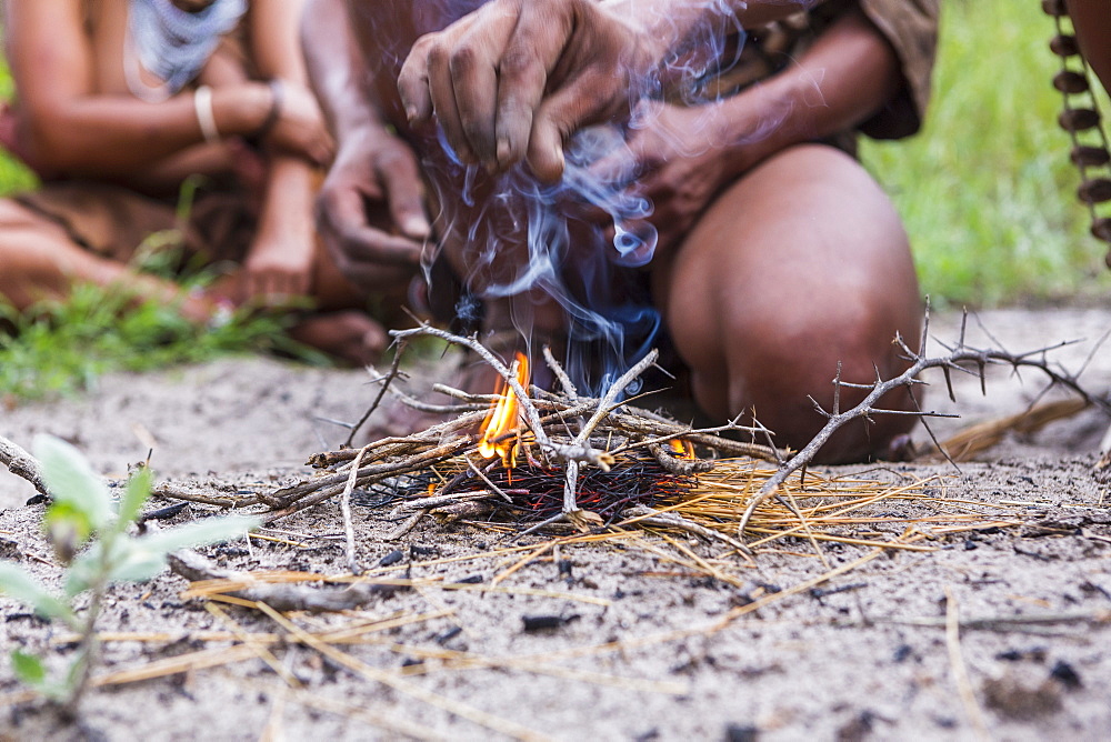 close up of Bushman creating fire, Botswana