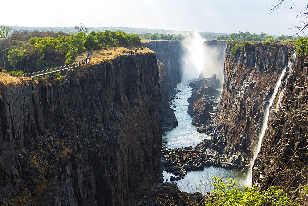 Victoria Falls viewed from the Zambian side, deep gorge with vertical sides, waterfall with torrents of white water, Victoria Falls, Zambia