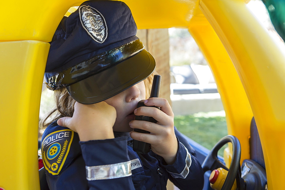 4 year old boy dressed as a police officer