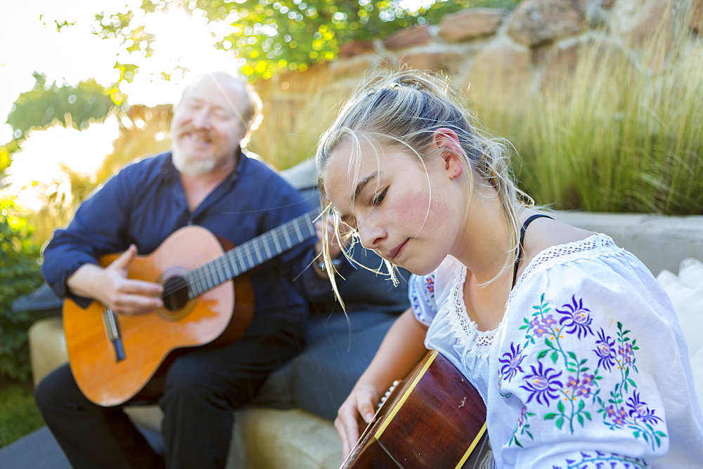 11 year old girl playing guitar