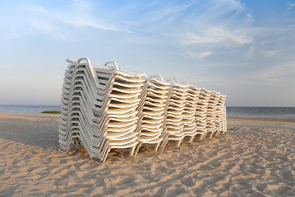 Stacked Lounge Chairs on a Beach, Estonia