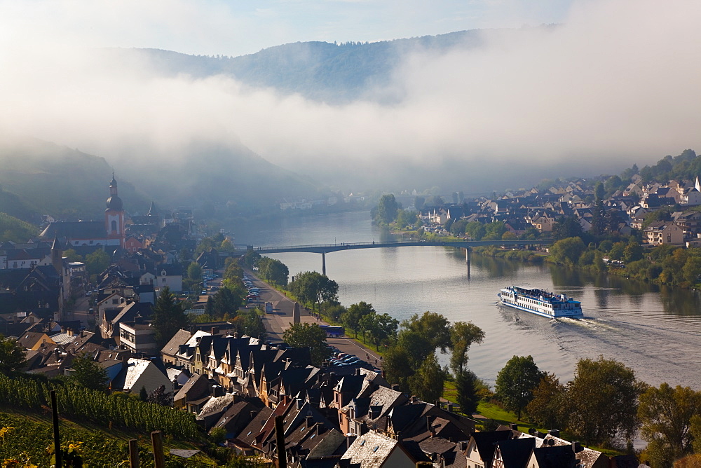 Zell, Mosel River Valley with morning mist clearing, Rhineland-Palatinate, Germany