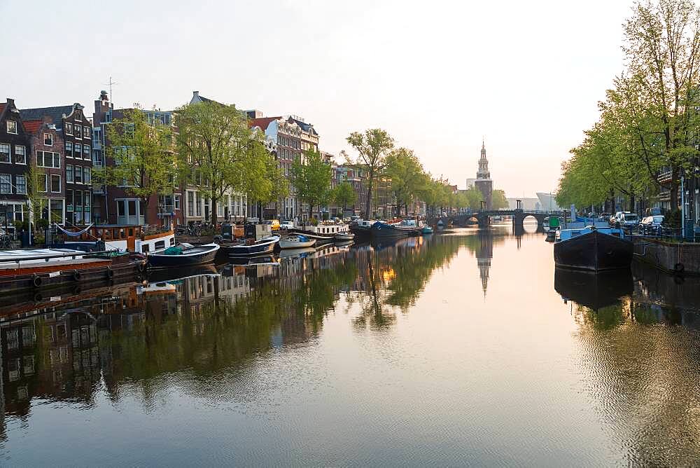 The Oudeschans canal in Amsterdam with the Montelbaanstoren tower in the background