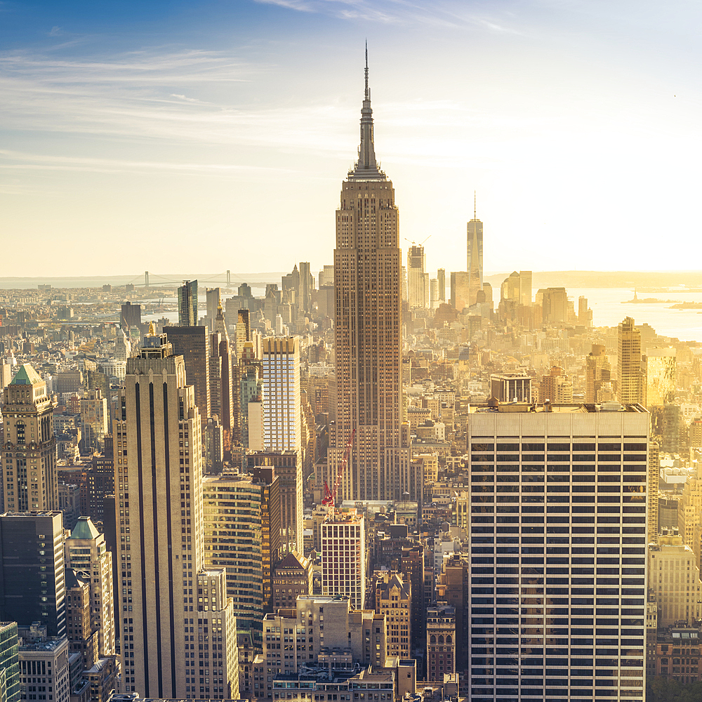 Empire State Building rising above Manhattan skyline.