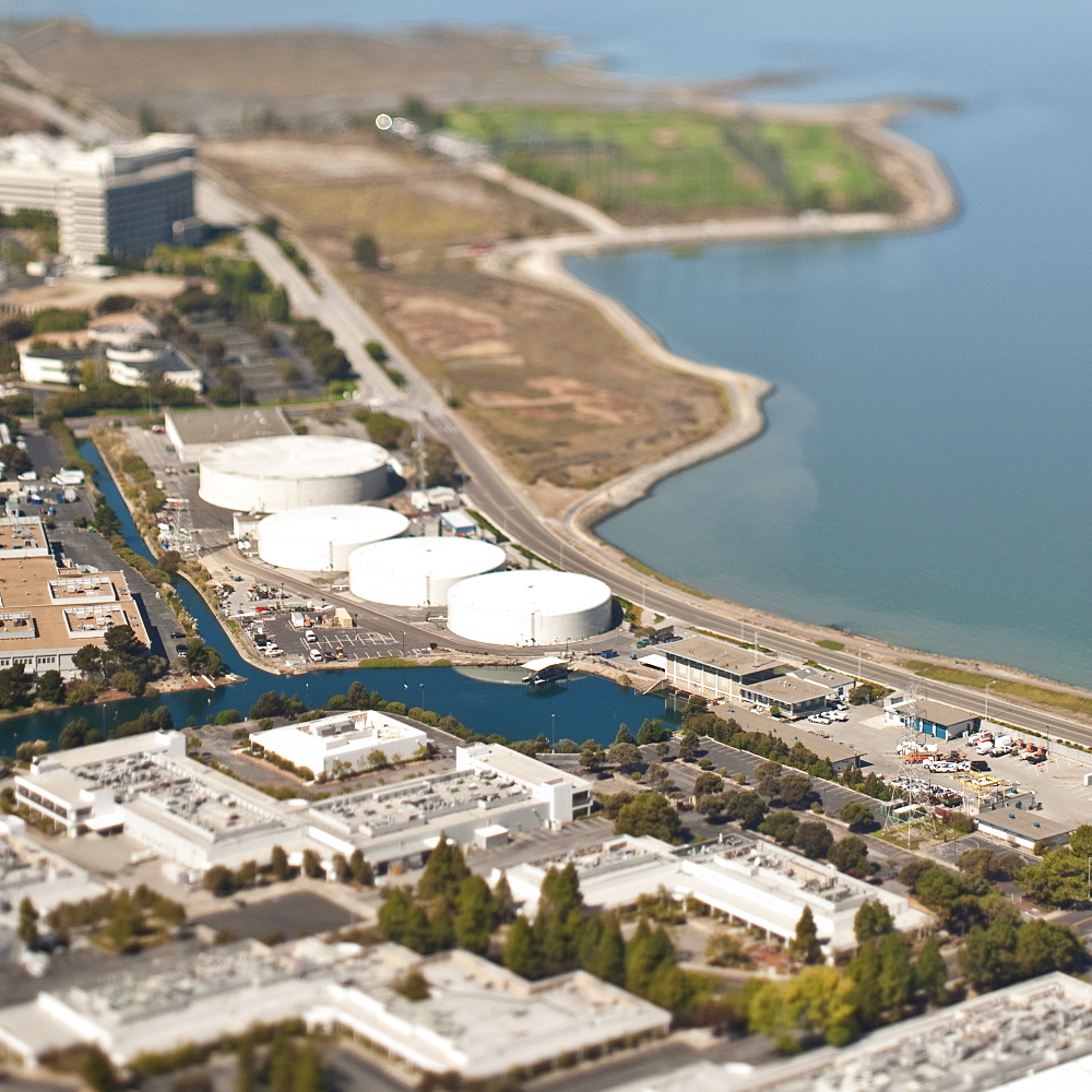 Urban sprawl with factory or processing plant