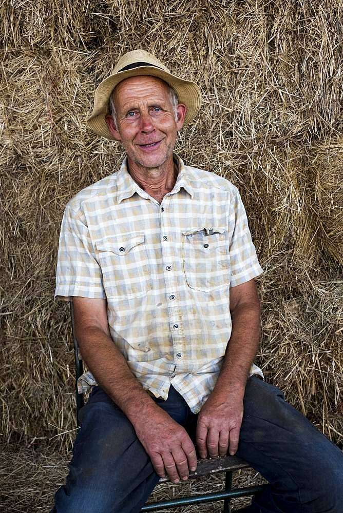 Smiling man, farmer in a hat