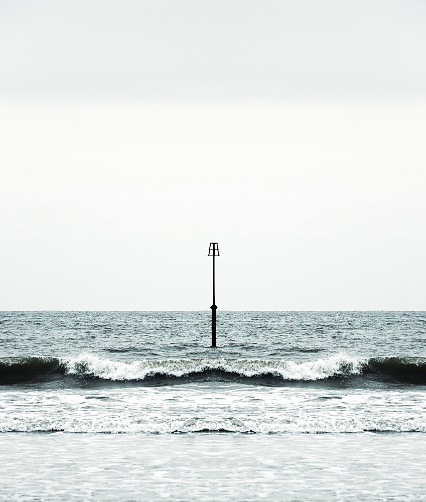 Beacon and Ocean Waves, Yorkshire, England, UK