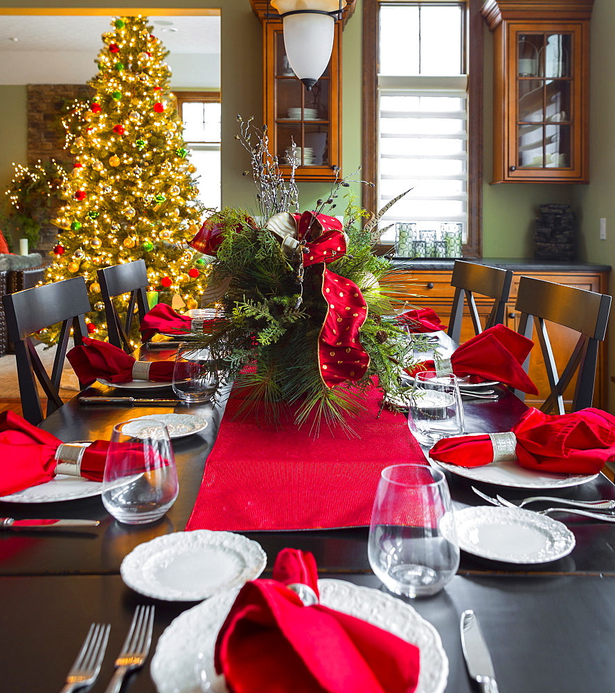 Christmas table and tree in dining room