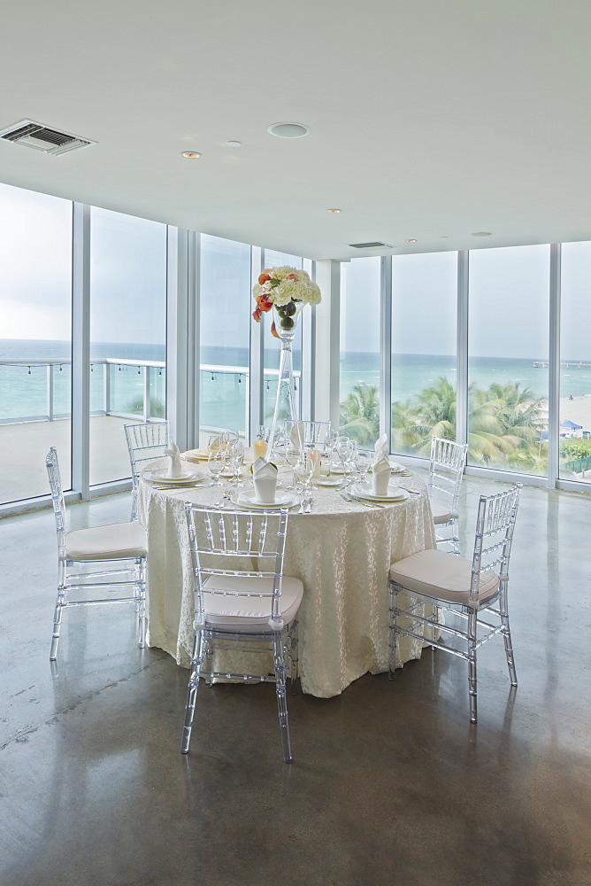 Empty tables in banquet hall, Miami, Florida, USA