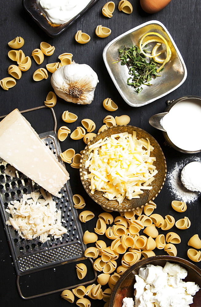 High angle view of cheese and pasta ingredients, Seattle, Washington, USA