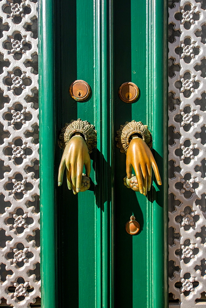 Door knockers in the form of hands, Algarve, Portugal