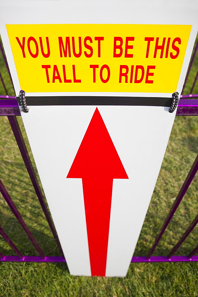 Height Requirment Sign In Front Of Amusement Park Ride, Tigard, Oregon, United States