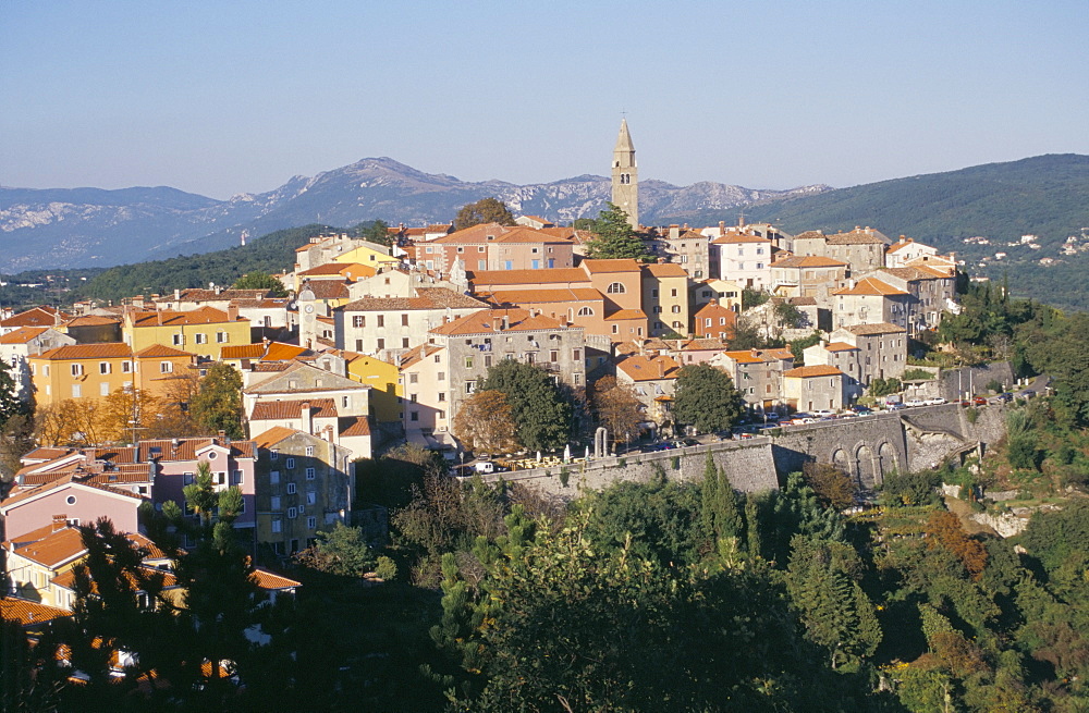 Ochre and pastels at sunset, medieval hilltop town, Labin, Istria, Croatia, Europe