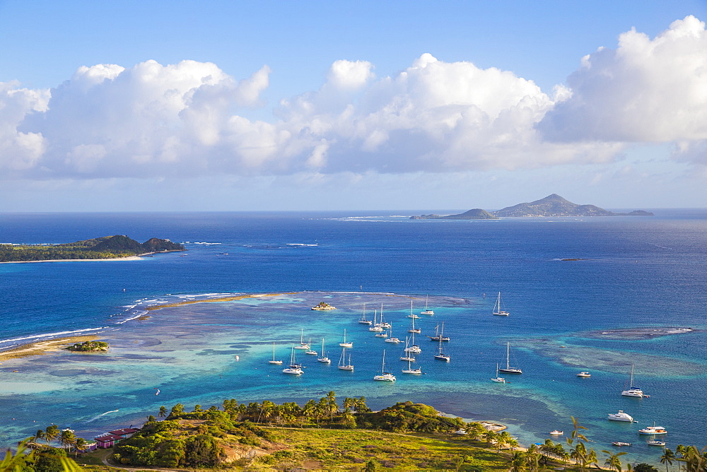 View towards Palm Island with Petit St. Vincent and Carriacou in distance, Union Island, The Grenadines, St. Vincent and The Grenadines, West Indies, Caribbean, Central America