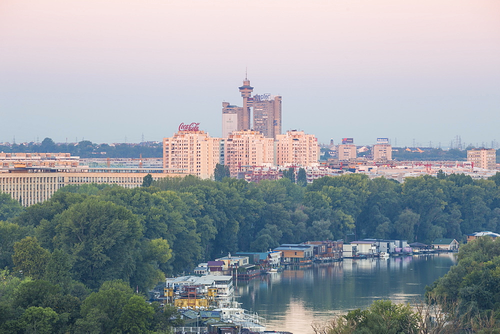 View of the confluence of the Sava and Danube rivers with Genex tower in distance, Belgrade, Serbia, Europe