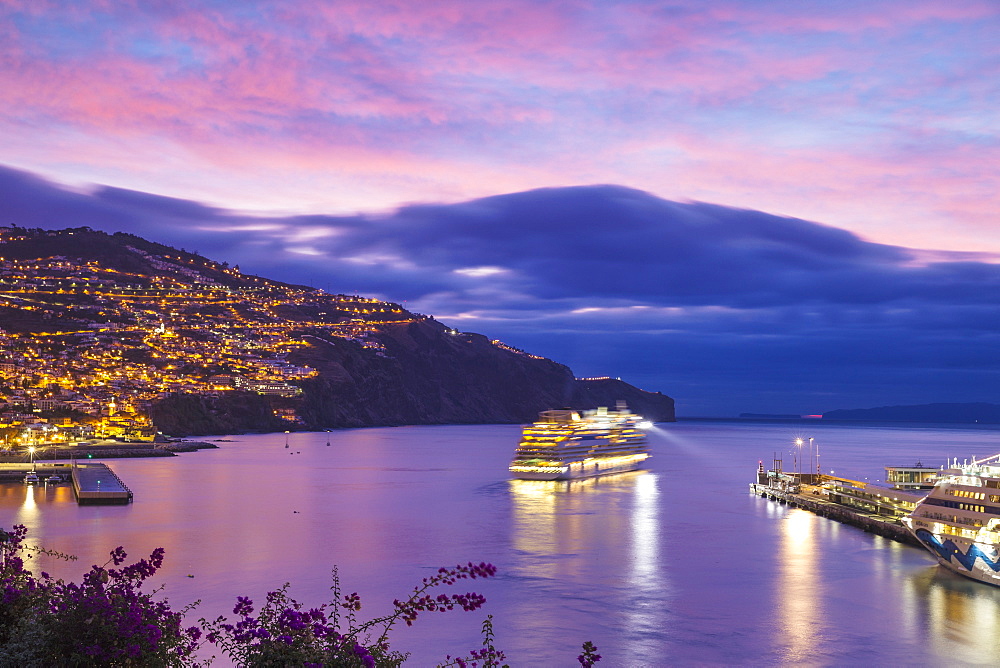 Cruise ship entering Funchal harbour at sunrise, Funchal, Madeira, Portugal, Atlantic, Europe