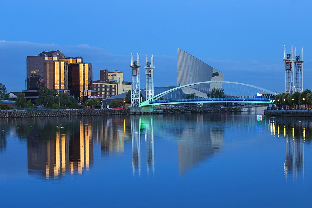 The Lowry footbridge and Imperial War Museum North, Salford Quays, Salford, Manchester, England, United Kingdom, Europe