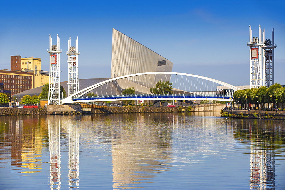 The Lowry footbridge and Imperial War Museum North, Salford Quays, Manchester, England, United Kingdom, Europe