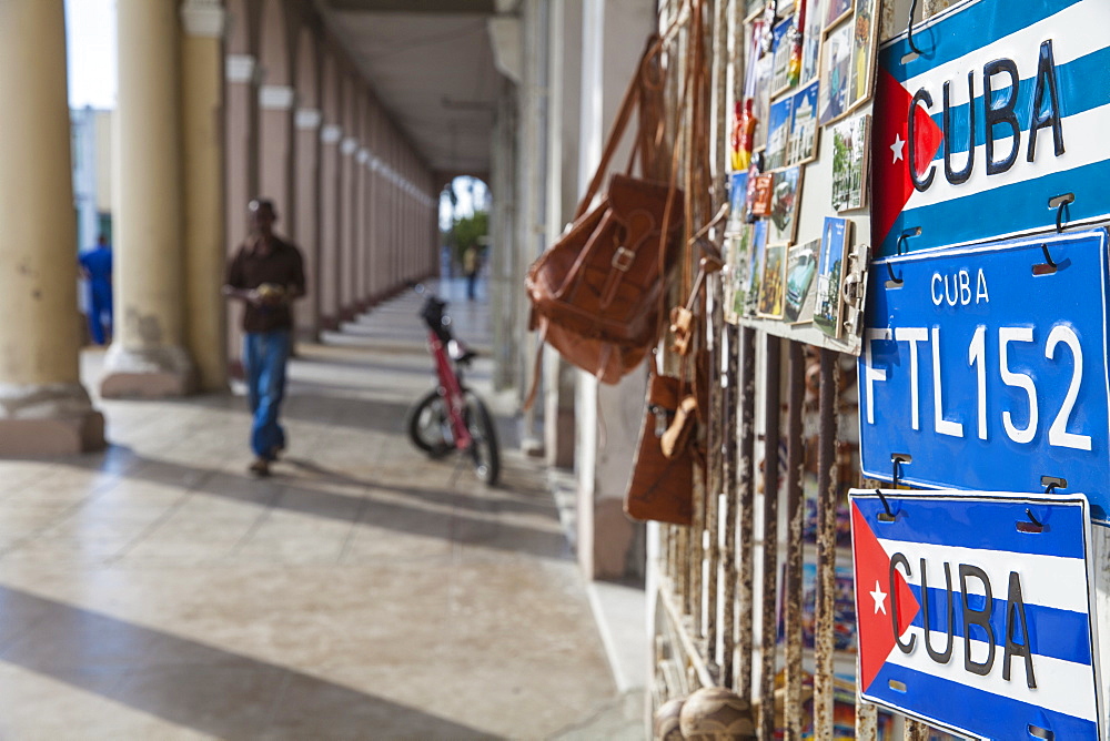 Columns on shops opposite Parque Marta, Cienfuegos, Cienfuegos Province, Cuba, West Indies, Caribbean, Central America