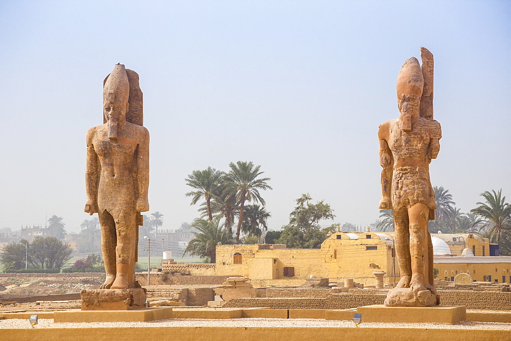 The Colossi of Amenhotep III at the Northern Gate of the Temple of Amenhotep III, UNESCO World Heritage Site, West Bank, Luxor, Egypt, North Africa, Africa