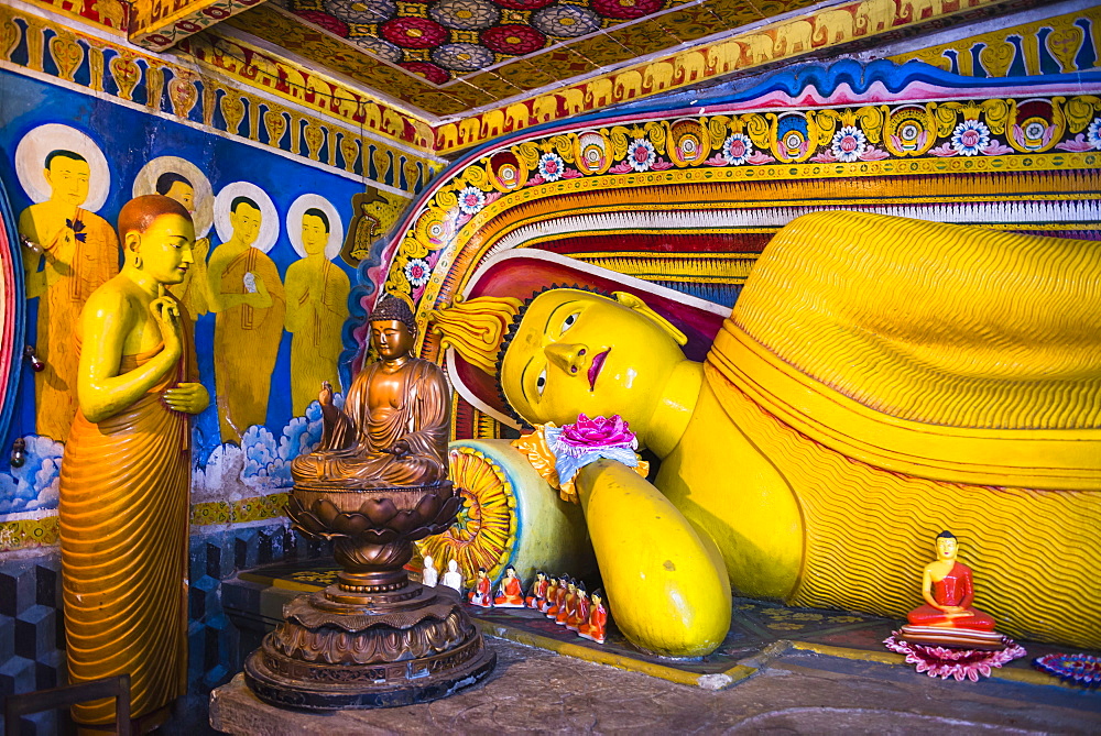 Golden reclining Buddha at Temple of the Tooth (Temple of the Sacred Tooth Relic) in Kandy, UNESCO World Heritage  Site, Sri Lanka, Asia