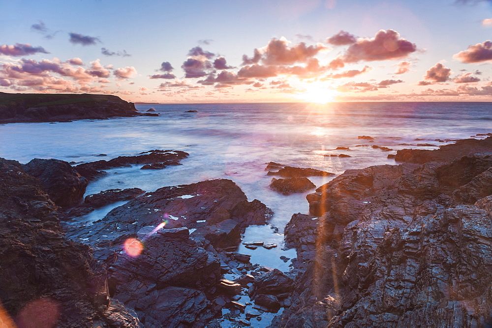 Rocky coast at Treyarnon Bay at sunset, Cornwall, England, United Kingdom, Europe