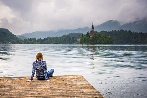 Woman looking at view, Lake Bled, Julian Alps, Gorenjska, Slovenia, Europe