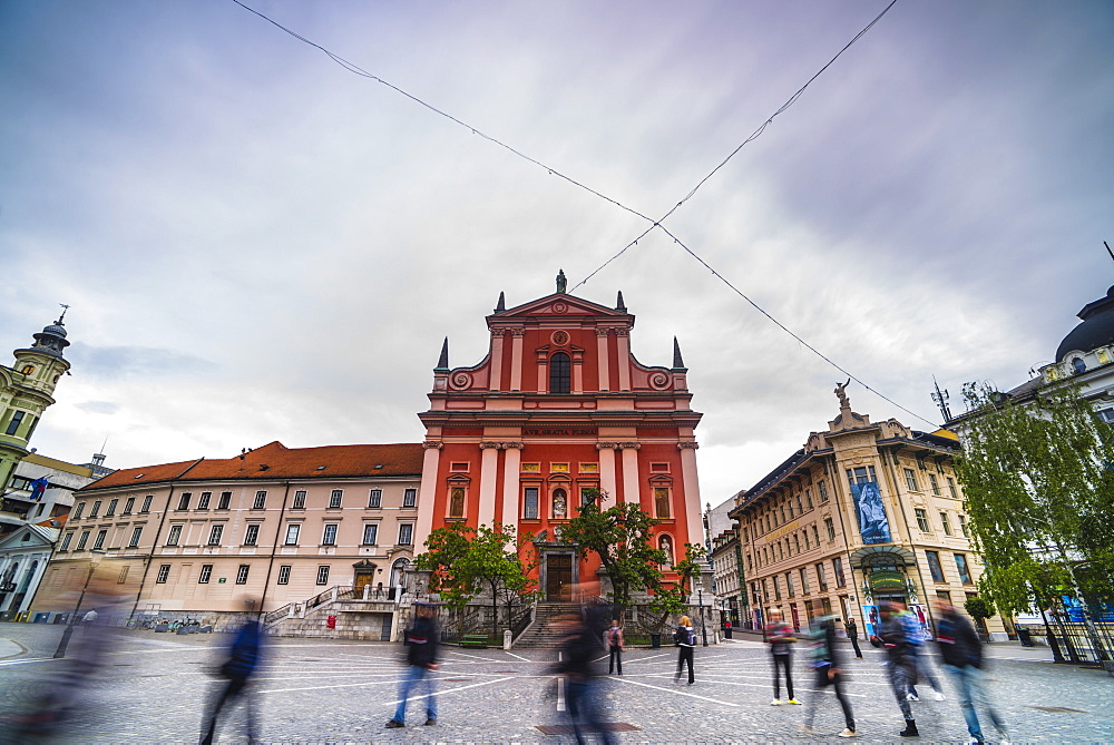 Tourists in Preseren Square (Trg) and the Franciscan Church of the Annunciation, Ljubljana, Slovenia, Europe