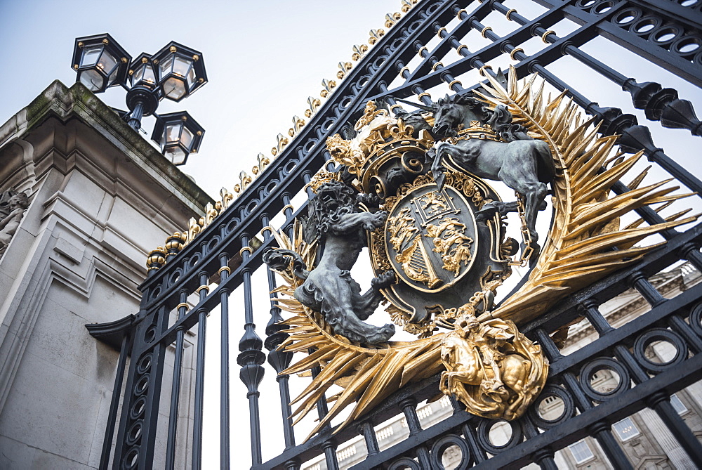 Royal Coat of Arms on the gates at Buckingham Palace, London, England, United Kingdom, Europe