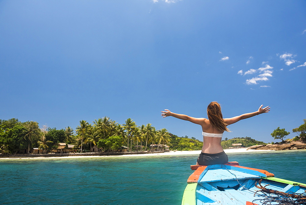 Woman on a traditional Indonesian boat trip to Marak Island near Padang in West Sumatra, Indonesia, Southeast Asia, Asia