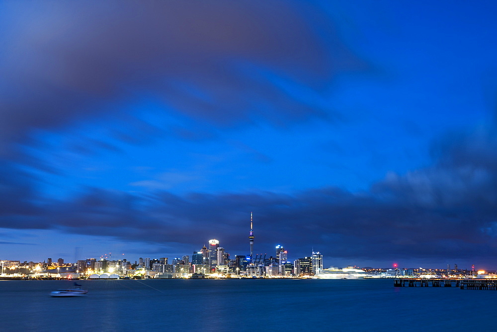 Auckland skyline at night seen from Devenport, Auckland, North Island, New Zealand, Pacific