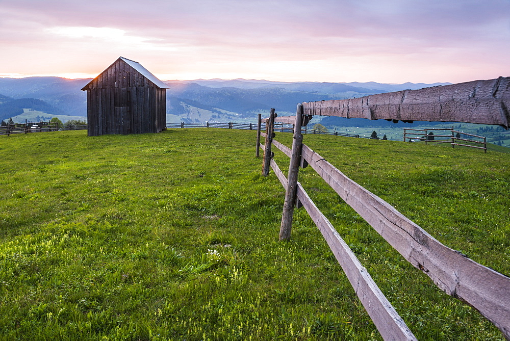 Rural Romanian landscape at sunrise in the Bukovina Region (Bucovina), Paltinu, Romania, Europe