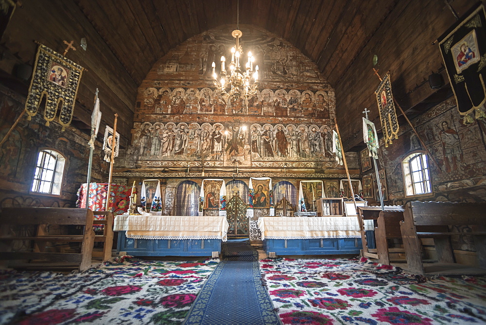 Old wooden painted church in Sarbi, Maramures, Romania, Europe