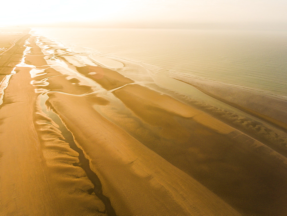 Camber Sands Beach at sunrise, Camber, near Rye, East Sussex, England, United Kingdom, Europe (Drone)