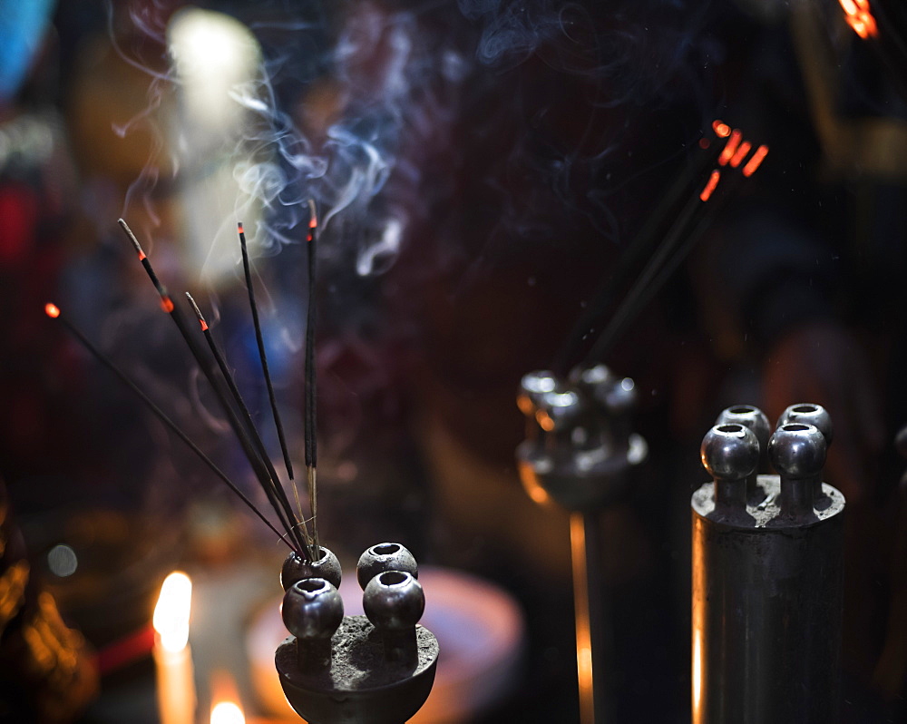 Incense burning at a Hindu temple in New Delhi, India, Asia